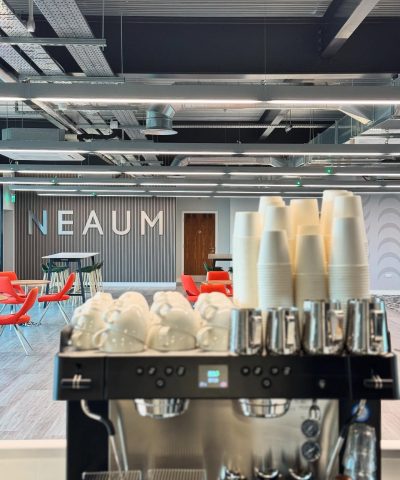 Cafe with coffee machine in focus